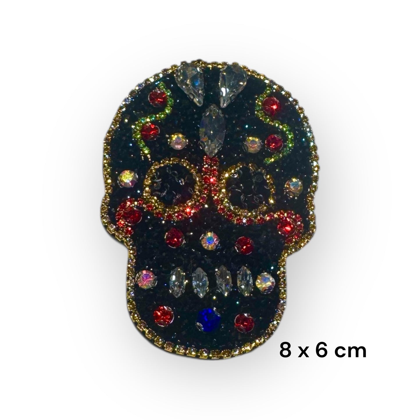 Calavera y corona pedrería