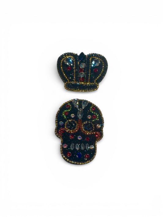 Calavera y corona pedrería